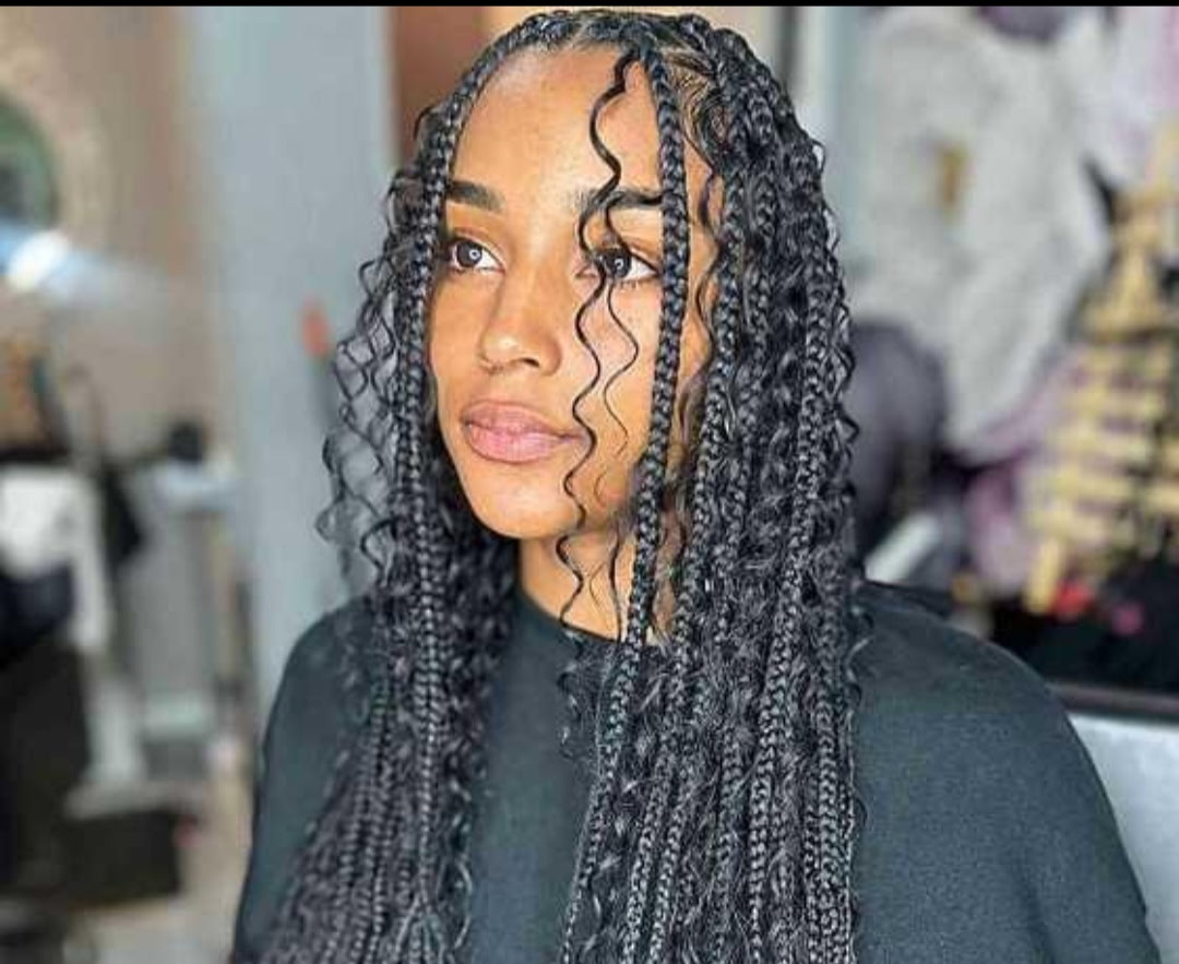Boho knotless braids with curly ends by Joy Braiding in Duluth, GA